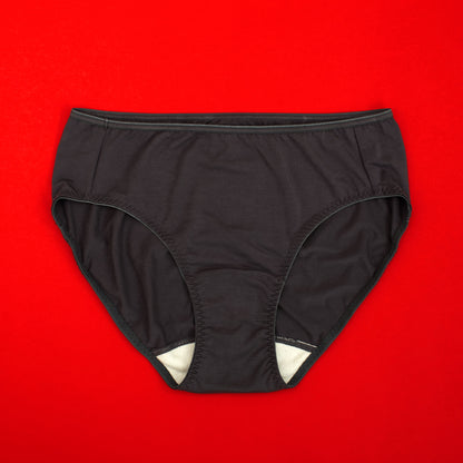 What is the Stay & Hold Set? A pair of black, seamless reusable period underwear designed for comfort, lightweight wear, and secure fit, ideal for use with reusable pads or liners.