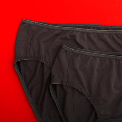 Black underwear on a red background